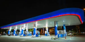 Petrol station forecourt with EV charging bays alongside fuel dispensers, illustrating a petrol station EV charging strategy
