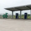 Newly built public EV charging station in India awaiting energisation, showing DC fast chargers, distribution transformer and metering cubicle — the assets an EV charging station license query is really about
